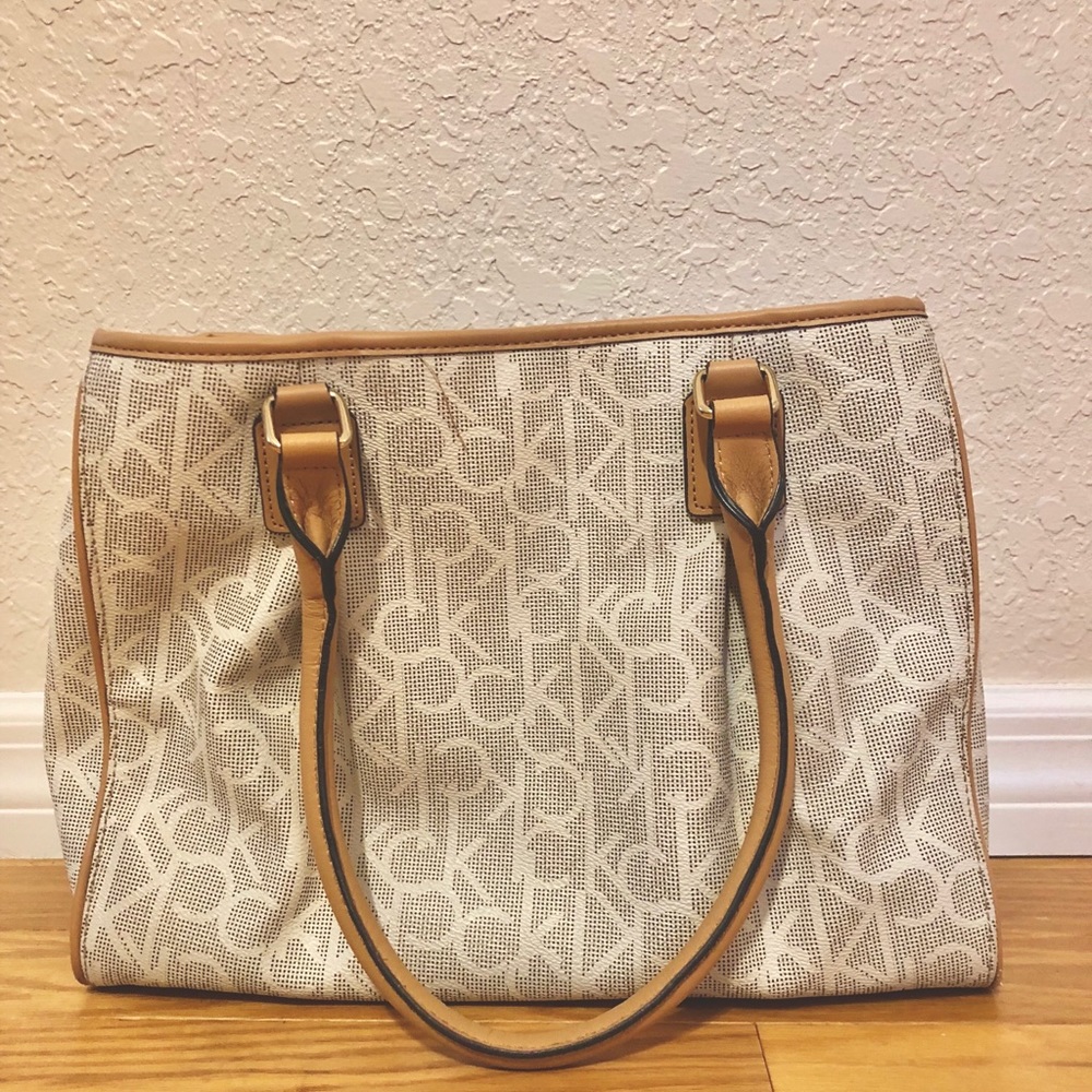 Great condition!! Cream and Tan Calvin Klein Purse